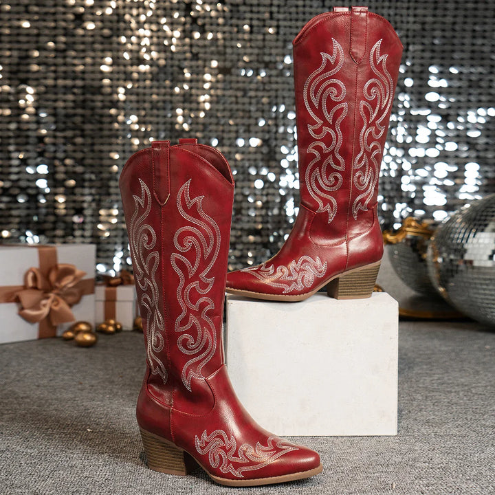 Pair of women's Western ankle boots featuring elegant embroidery, high-quality faux leather, fashion-forward design