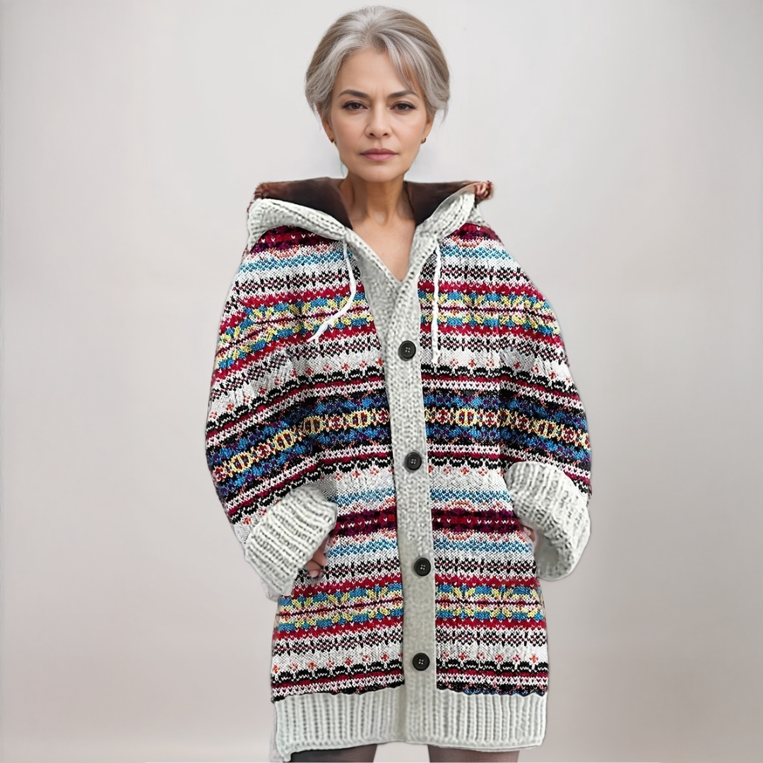 Women's Fair Isle hooded knit cardigan, beige with blue and red patterns, a cozy winter fashion sweater.