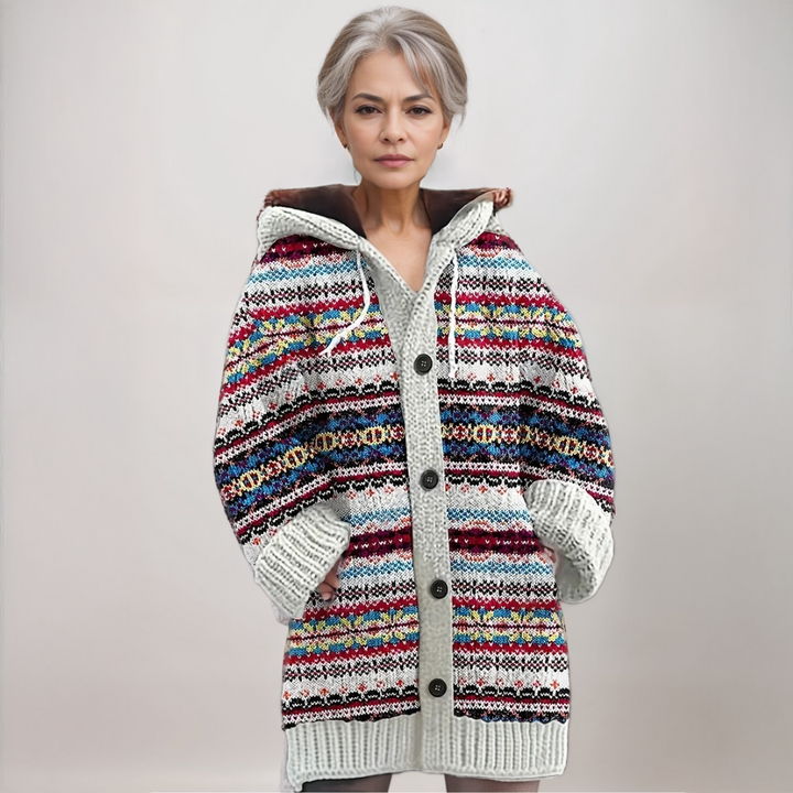 Women's Fair Isle hooded knit cardigan, beige with blue and red patterns, a cozy winter fashion sweater.