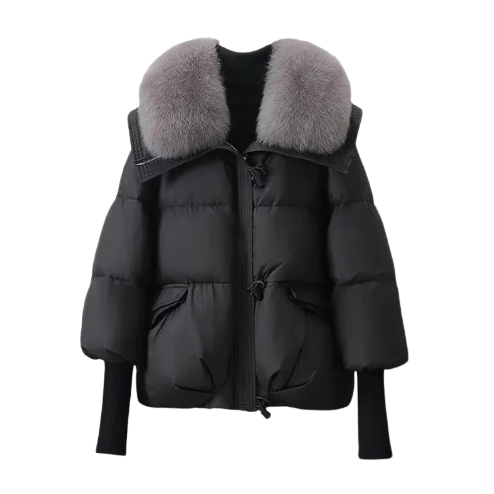 Detail of the quilting on a women's warm winter puffer jacket with a stylish faux fur collar
