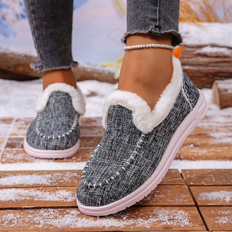 Stylish women's slip-on loafers in faux suede with cozy fur lining, ideal as casual shoes