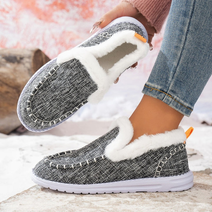 Women's casual faux suede loafers with luxurious fur lining, a chic and cozy footwear option