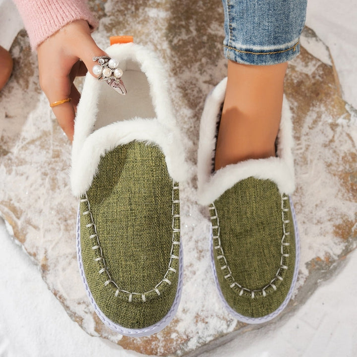 Fashionable women's fur-lined slip-on loafers, combining faux suede style with ultimate comfort