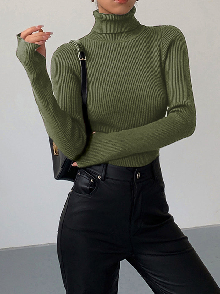 Assortment of women's ribbed knit turtleneck sweaters in various colors, showcasing ultimate spring versatility.