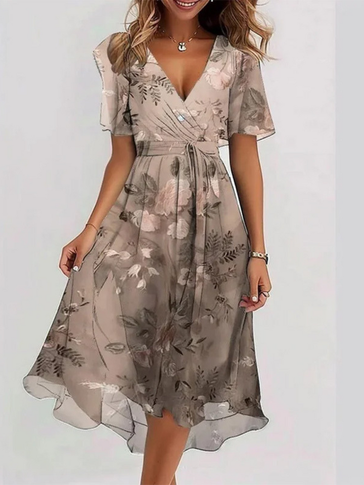Women's flattering summer midi dress with belly cover design, perfect for casual elegance.