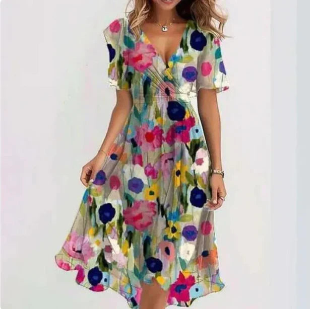 Vibrant floral print boho wrap midi dress for women. V-neck, puff sleeve summer dress; elegant & casual chic.