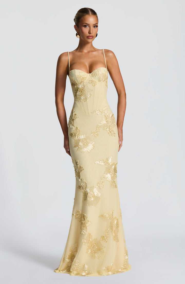 Women's floral corset maxi dress for wedding guests. Elegant spaghetti strap formal occasion wear.