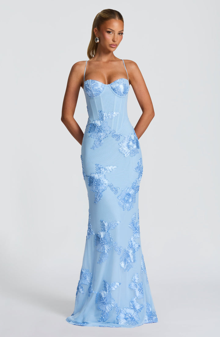 Stylish women's floral corset maxi dress with spaghetti straps. Ideal for elegant wedding guest or formal party.