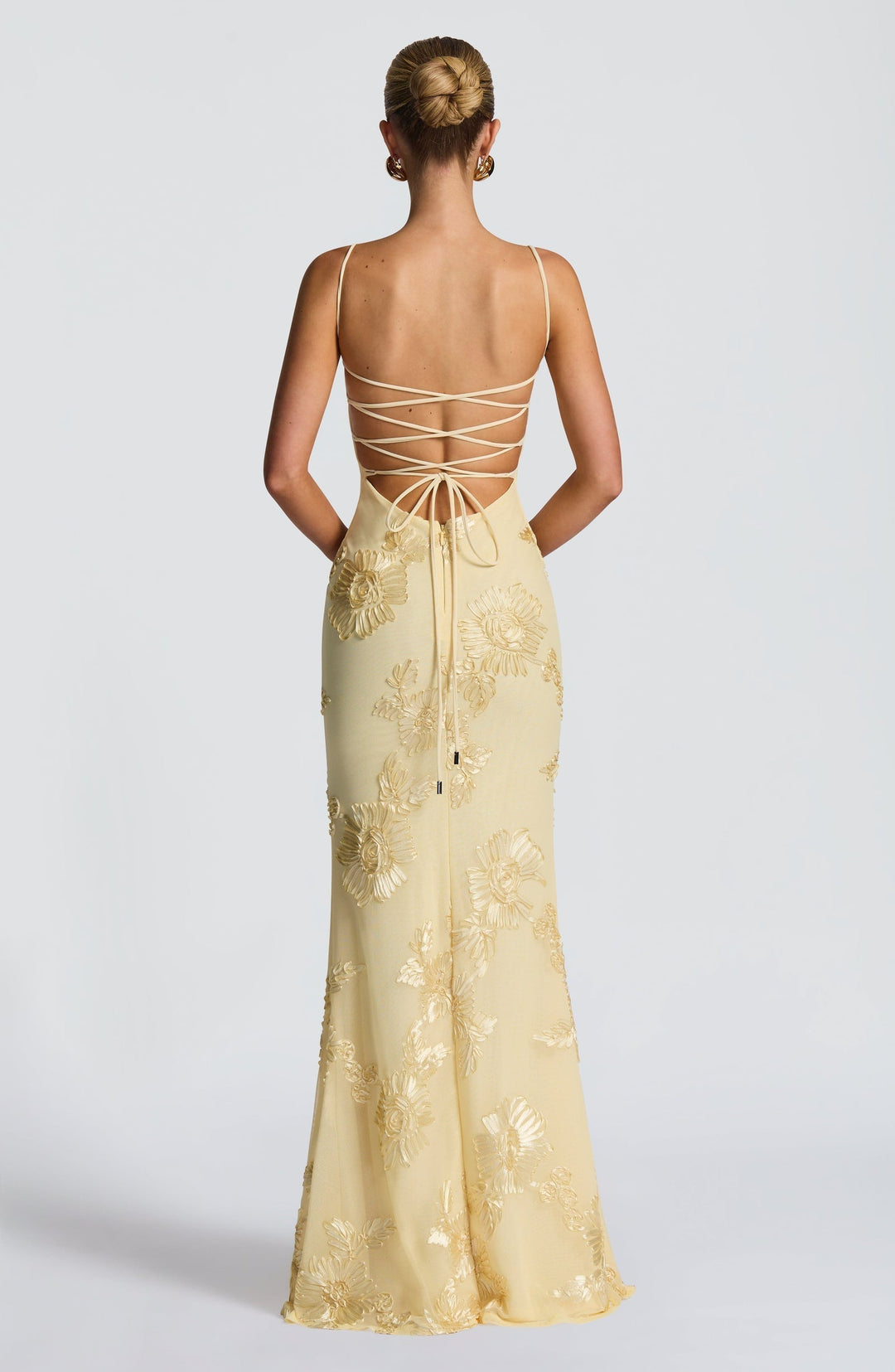 Beautiful floral corset maxi dress for women. Spaghetti strap design, perfect for spring wedding guests.
