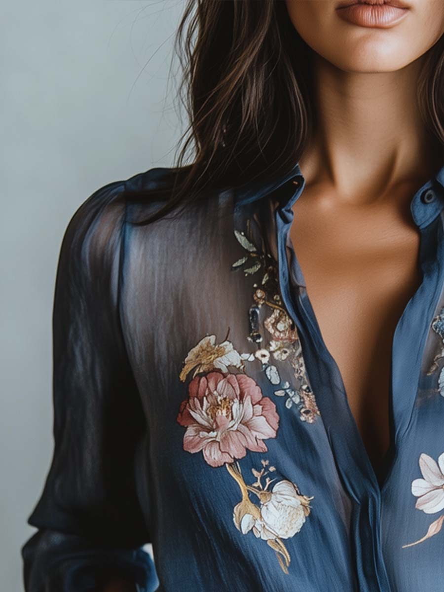 Feminine fashion: Women's stylish blouse with floral embroidery & sheer long sleeves.