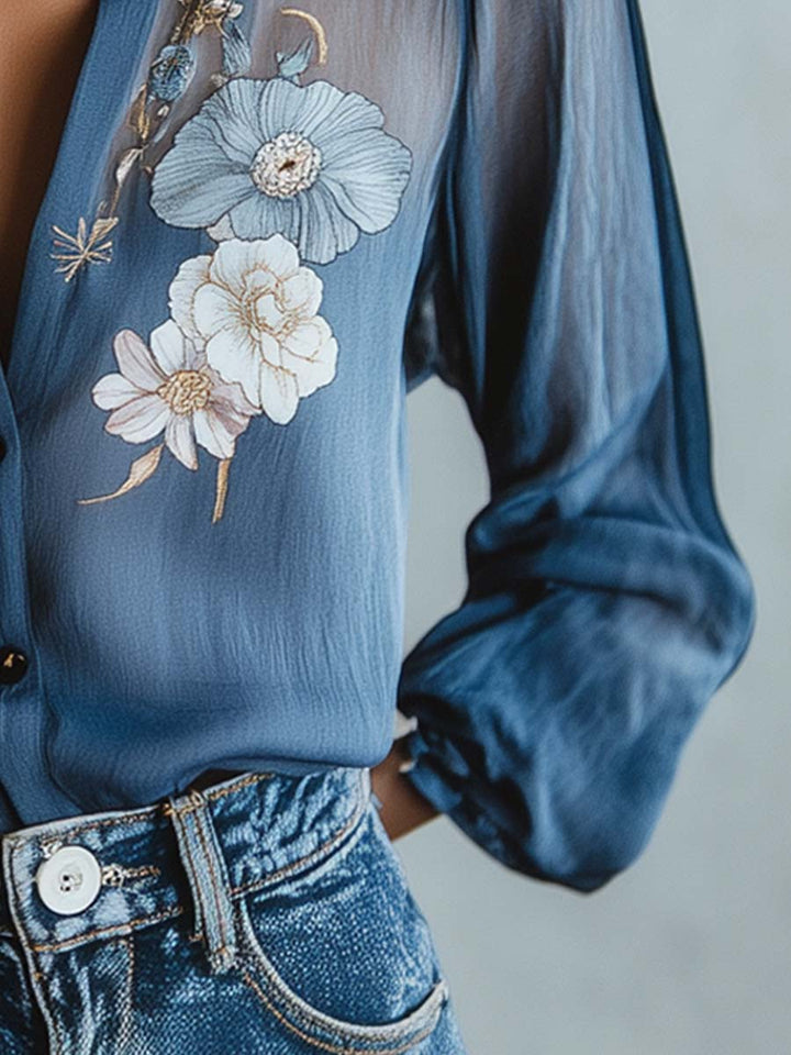 Elegant women's blouse, floral embroidery, sheer sleeves, v-neck. Ideal for evening.