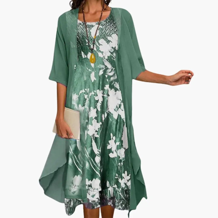 Effortless women's two-piece set featuring a vibrant floral long dress & coordinating cardigan.