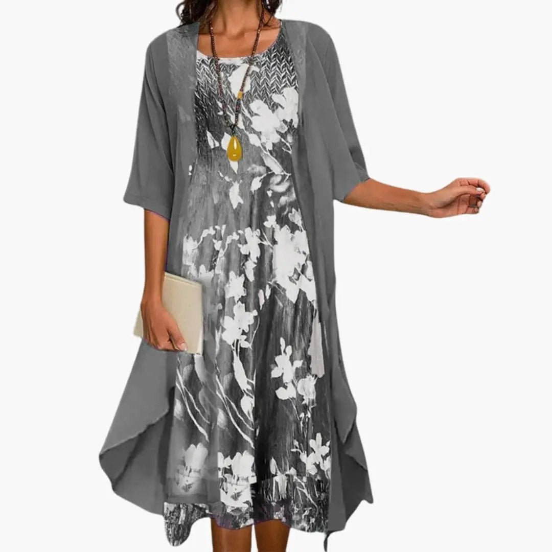 Elegant women's long dress and cardigan ensemble; a fashionable floral print layered outfit for any occasion.