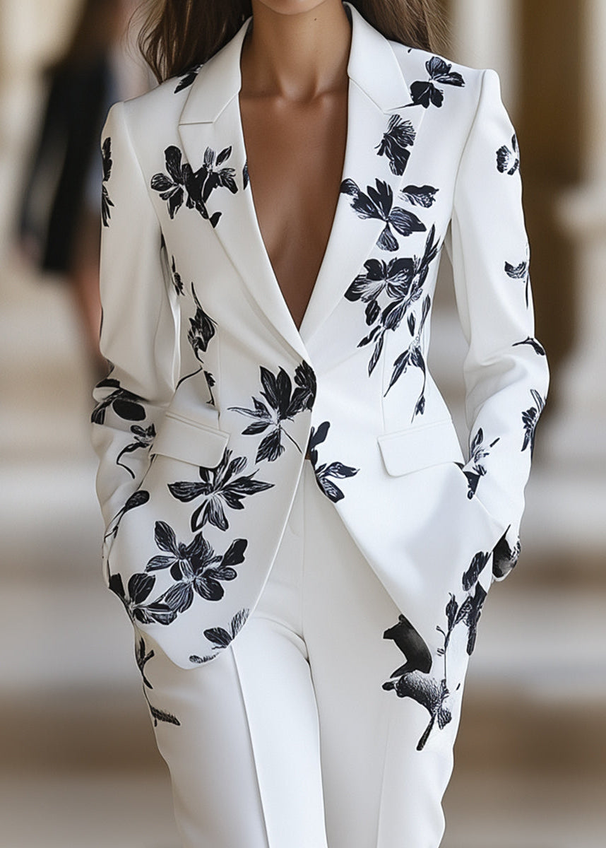 Elegant ladies floral pant suit with a single-button tailored blazer, ideal for professional wear & special events.