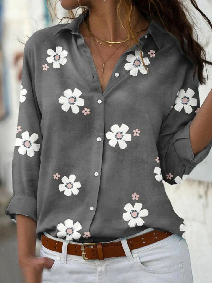Stylish women's long-sleeve floral print blouse, a versatile button-front top for spring, autumn, or work fashion.