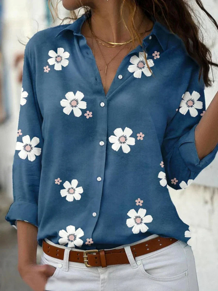 Elegant women's collared floral print blouse, featuring a button front and long sleeves. Feminine and chic casual top.