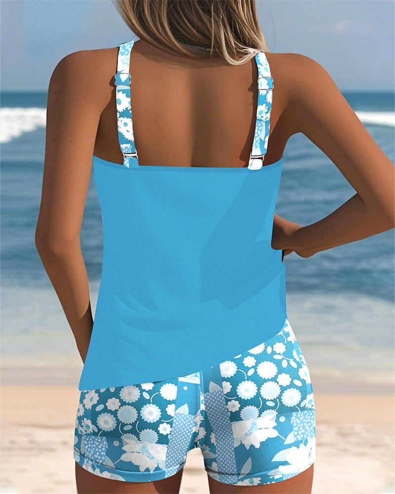 Women's floral print tankini & boyshort set. Ideal for beach, pool, vacation. Essential summer style.