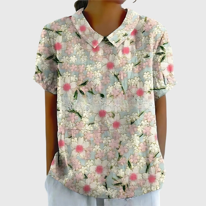 Elegant women's floral print blouse with Peter Pan collar & short sleeves, perfect for spring casual wear.