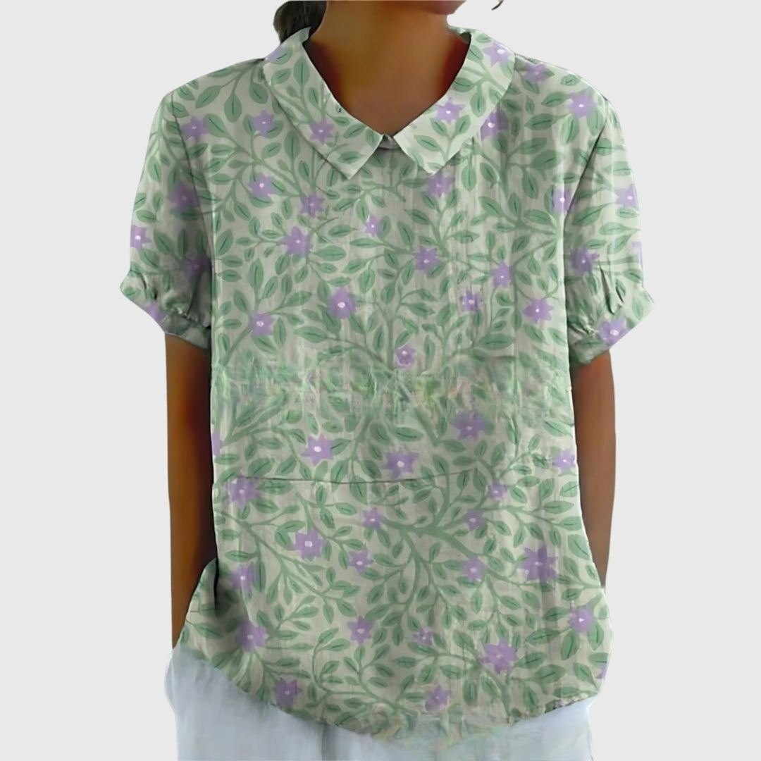 Versatile women's floral print short sleeve collared top, suitable for both casual and elegant occasions.