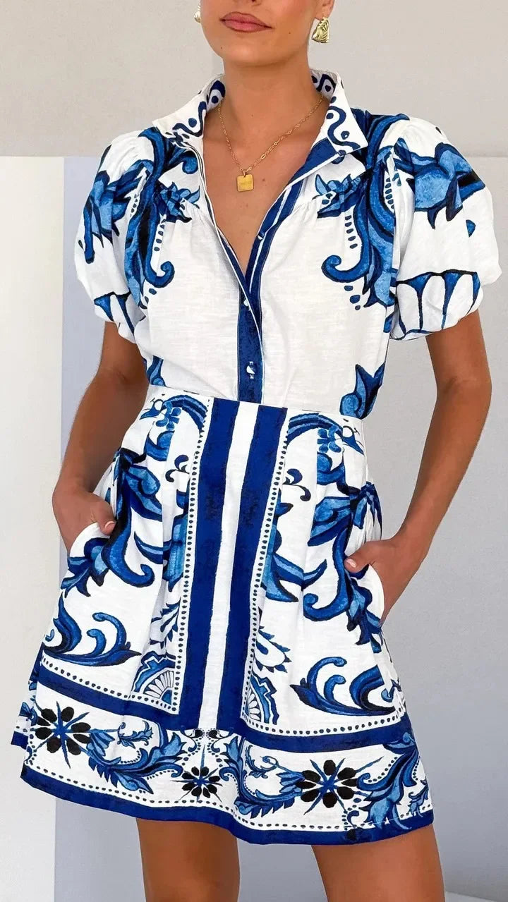 Chic floral puff sleeve mini dress for women. Vibrant fashion for date nights & events.