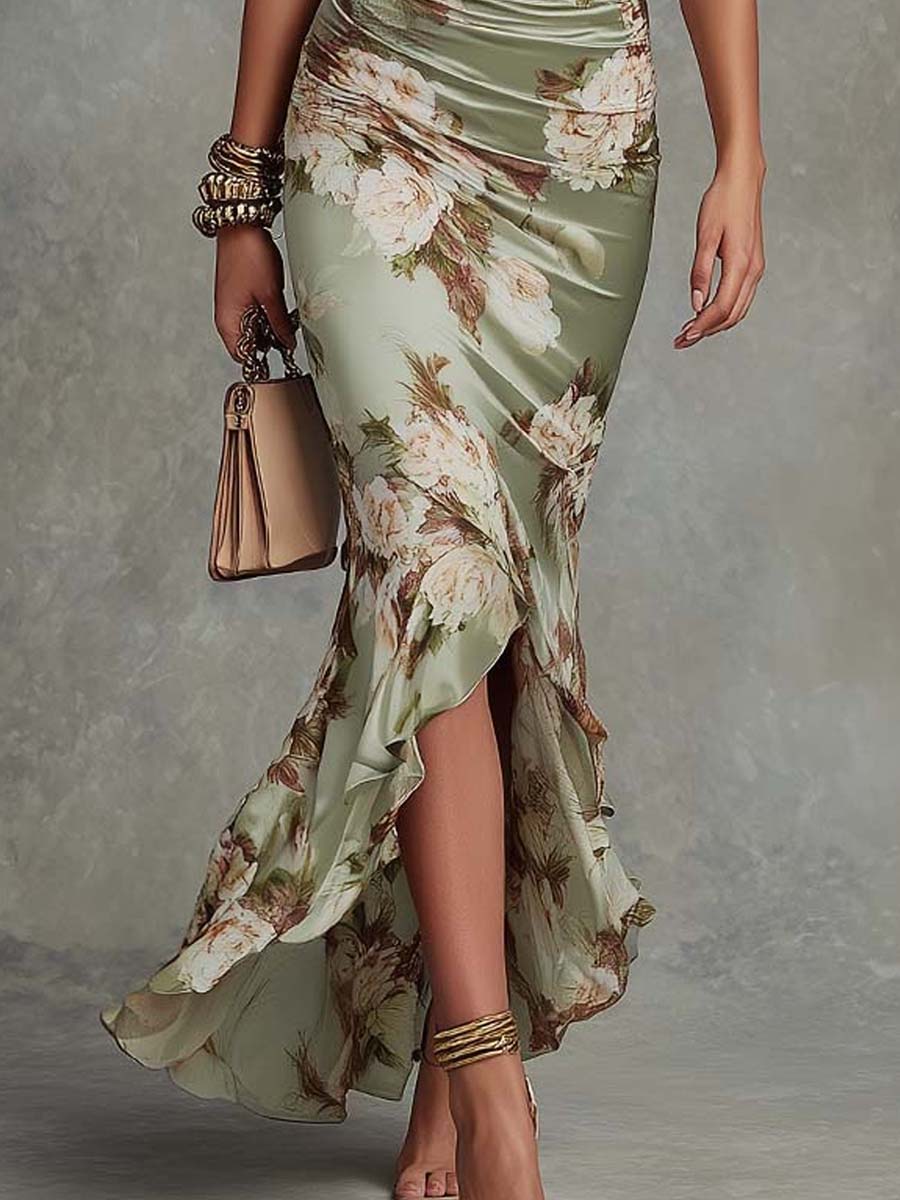 Women's elegant floral ruched fishtail maxi dress with a v-neck & frill sleeves, perfect for weddings & parties.