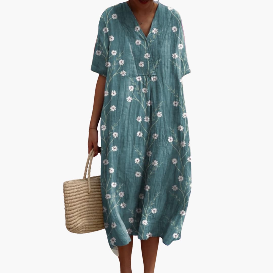 Plus size friendly floral V-neck midi dress with short sleeves. Oversized and flowy for ultimate comfort.