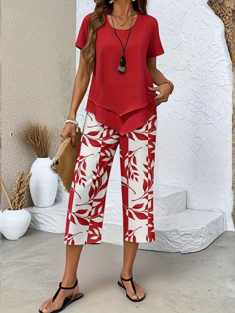 Summer vacation outfit: comfortable women's floral V-neck top & wide-leg pant set. Stylish two-piece casual wear.