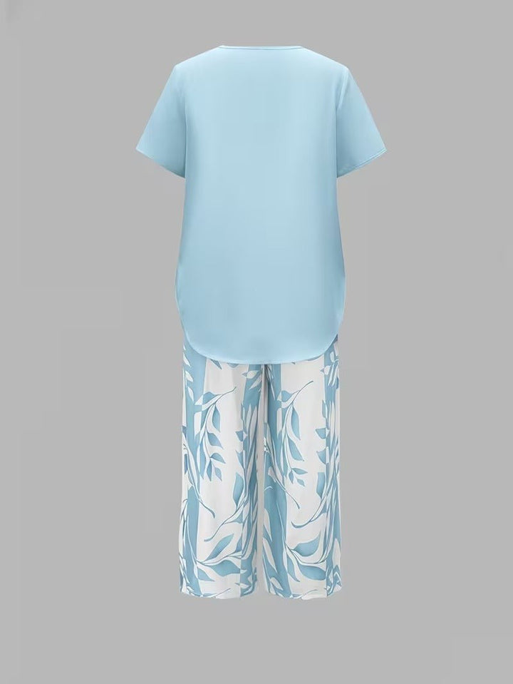 Soft, breathable fabric on women's floral V-neck top & wide-leg pant lounge wear set for ultimate comfort.
