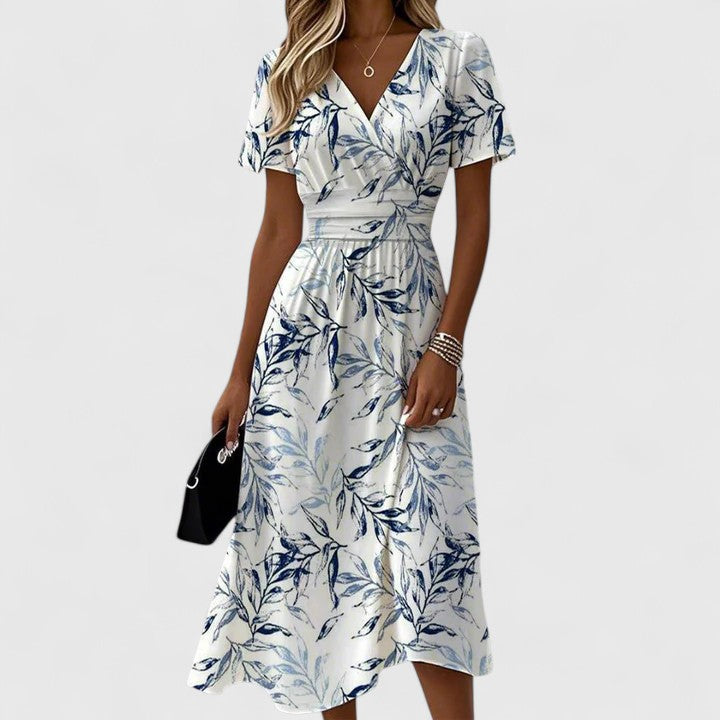 Elegant women's floral wrap midi dress featuring a V-neck and delicate flutter sleeves; versatile for any occasion.