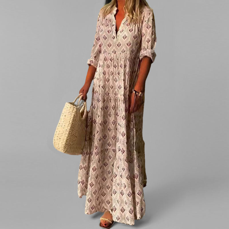 Women's flowing tiered V-neck maxi dress, elegant and comfortable for summer or casual wear.