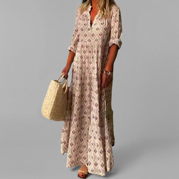 Women's flowing tiered V-neck maxi dress, elegant and comfortable for summer or casual wear.