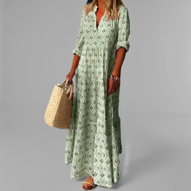 Elegant women's V-neck long sleeve maxi dress with tiered skirt. Perfect flowing casual summer fashion.