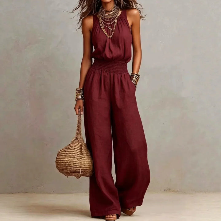 Chic women's flowing wide leg halter jumpsuit, an effortless one-piece for stylish summer outfits and comfort.