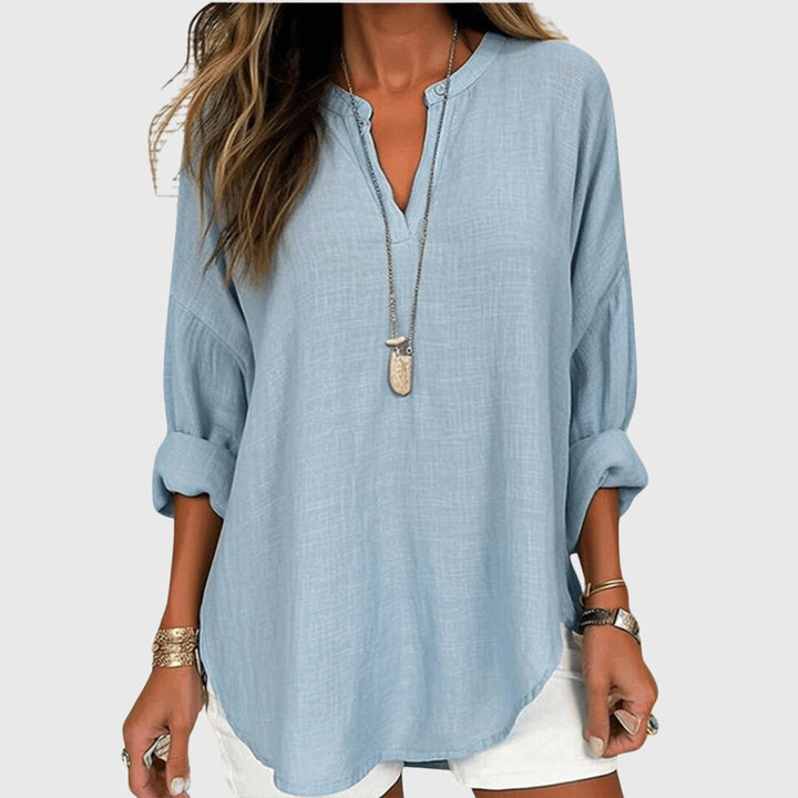 Women's flowy elegant long sleeve beach shirt, perfect for summer resort wear & casual chic style.