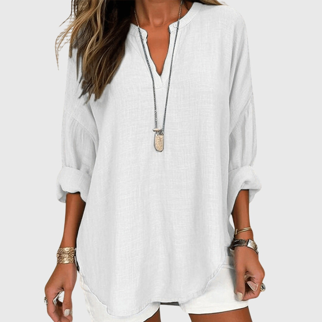 Comfortable women's long sleeve beach shirt, a flowy top ideal for summer style and resort elegance.