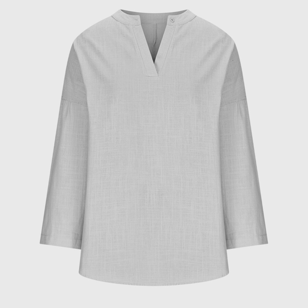 Breathable women's flowy elegant long sleeve beach shirt, a chic resort wear top for your summer vacation.