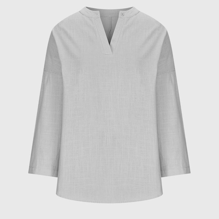 Breathable women's flowy elegant long sleeve beach shirt, a chic resort wear top for your summer vacation.