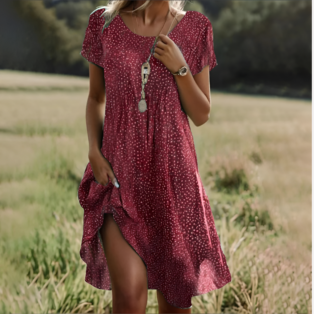 Elegant women's flowy midi dress, a comfortable sleeveless option for spring and summer.