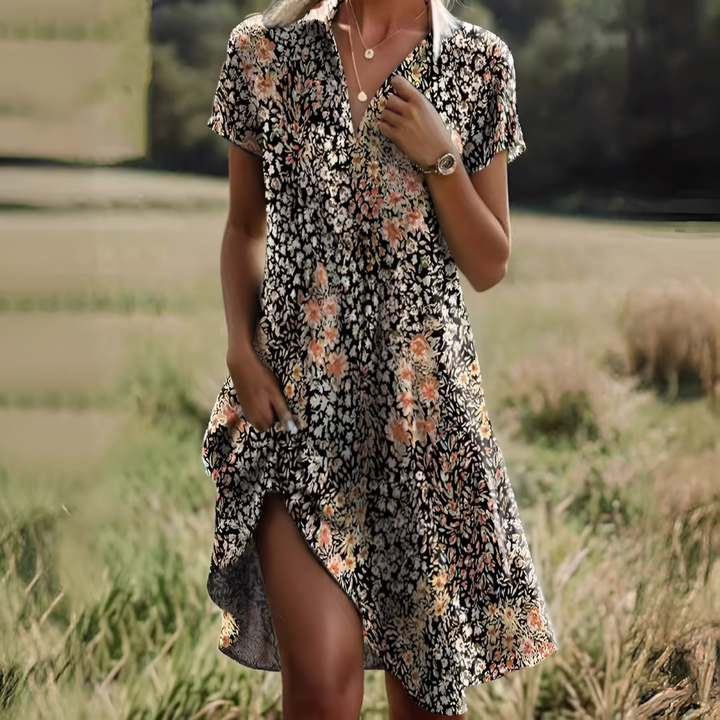 Versatile women's flowy midi dress, suitable for summer, beach, or casual everyday wear.