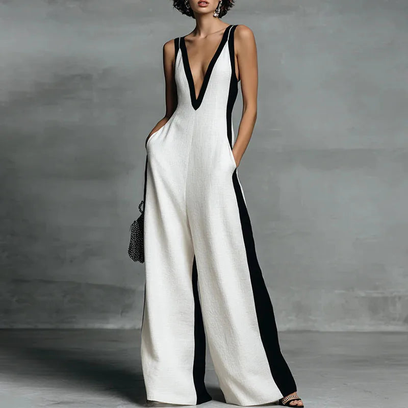 Women's flowy wide-leg jumpsuit with V-neck, sleeveless, offering effortless style & comfort for summer.