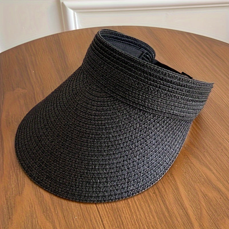 Stylish women's foldable wide brim sun visor for ultimate UV protection. A summer travel essential.