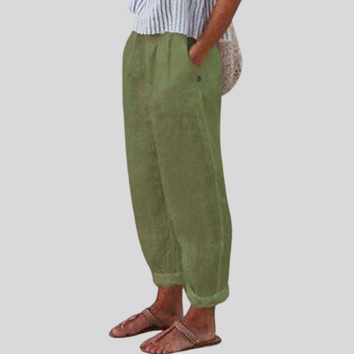 Comfortable women's lightweight trousers with stylish folded hem, ideal for warm weather casual fashion.