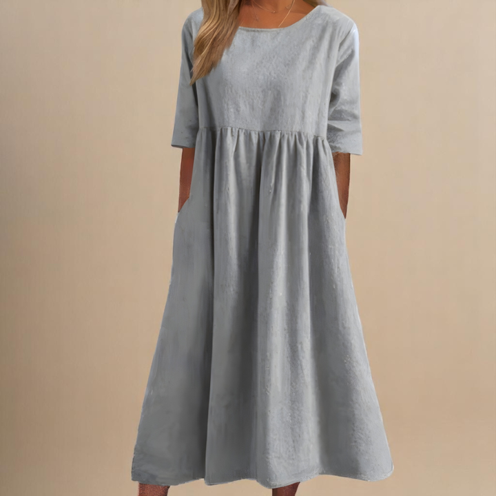 Versatile A-line half-sleeve midi dress for women, perfect as a casual or everyday comfortable dress.