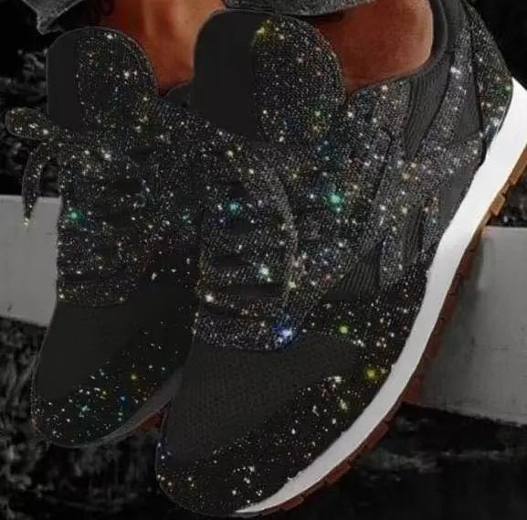 Comfortable women's fashion sneakers. Glittering lace-up design adds sparkle to any casual or trendy outfit.