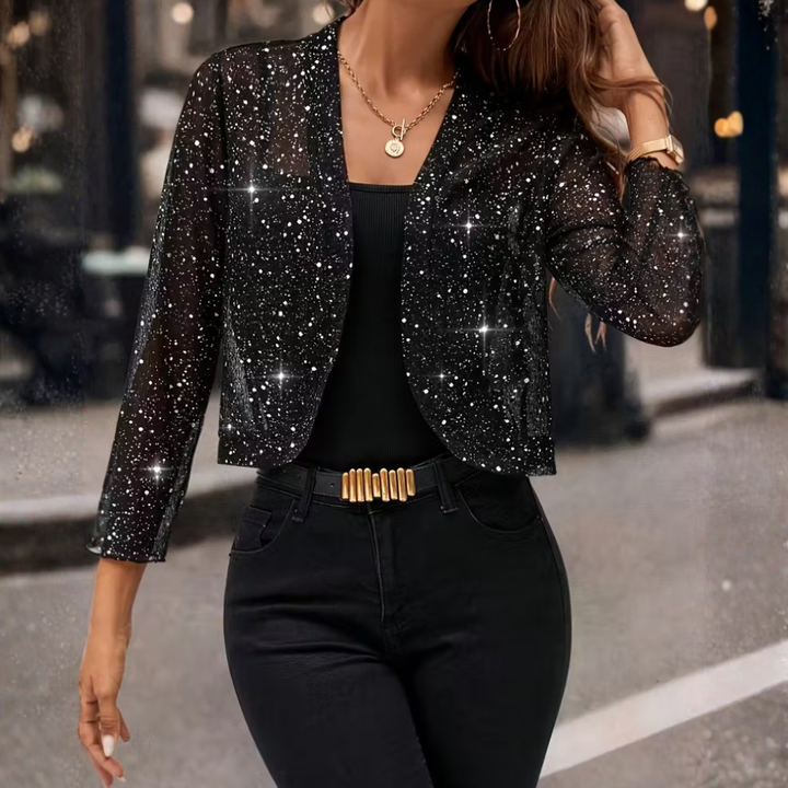 Shimmering women's sequin cardigan. Long sleeve, open front glitter jacket for party, evening, or casual chic.