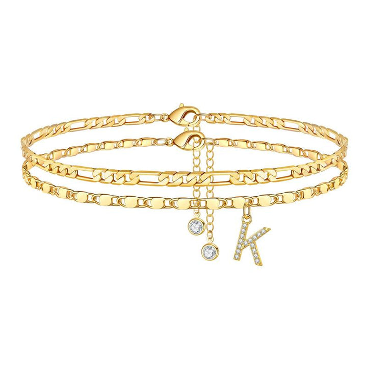 Women's gold initial 'H' anklet with a bright crystal charm, personalized fashion accessory