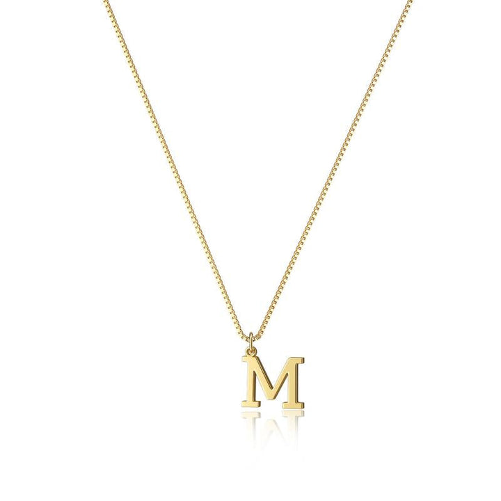 Women's gold initial pendant, a minimalist and elegant statement piece