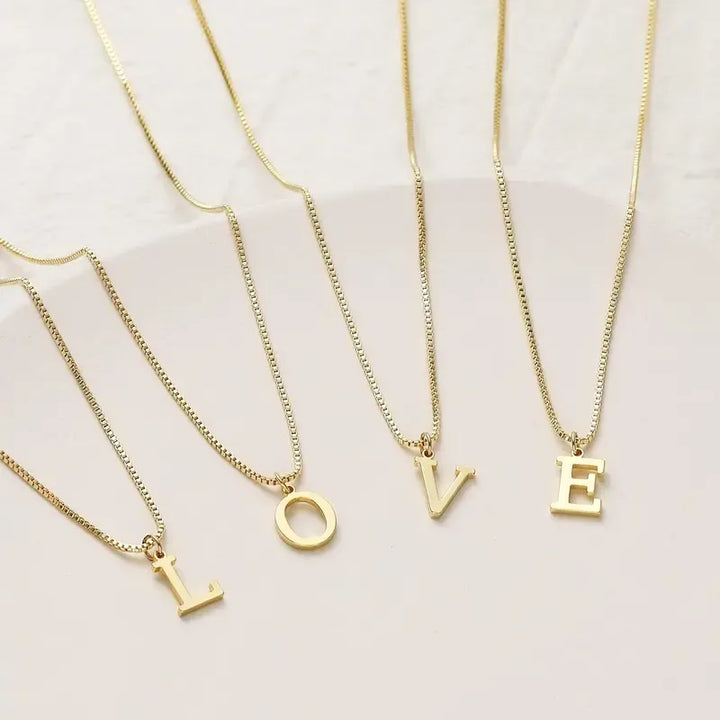 Shiny gold plated initial necklace, a beautiful women's jewelry piece