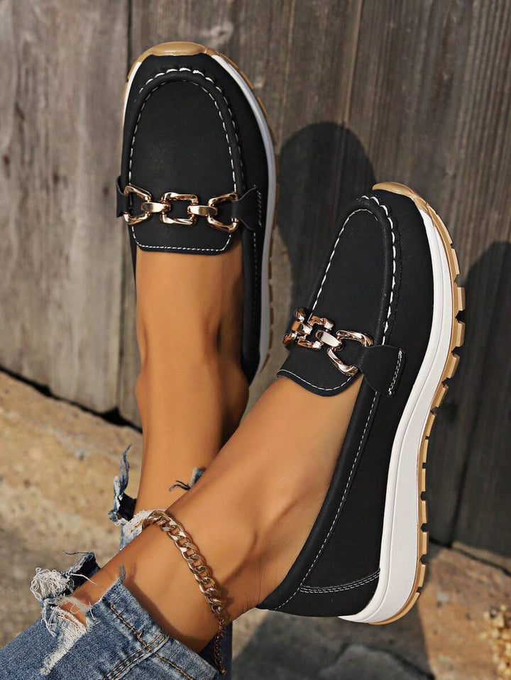 Everyday women's slip-on loafers, gold horsebit design, offering all-day comfort and timeless fashion.