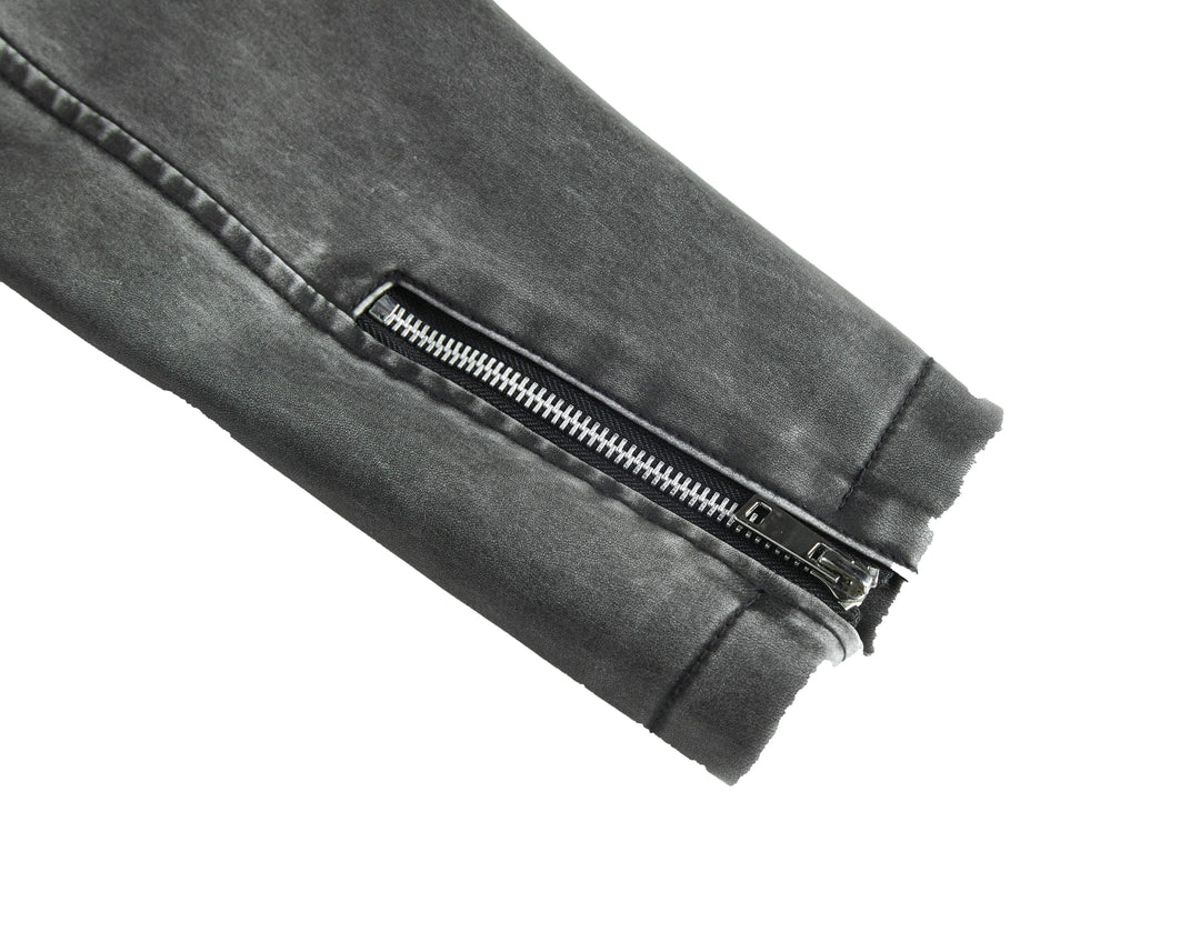Back view of a women's gray faux leather moto jacket, highlighting the tailored fit and versatile style.